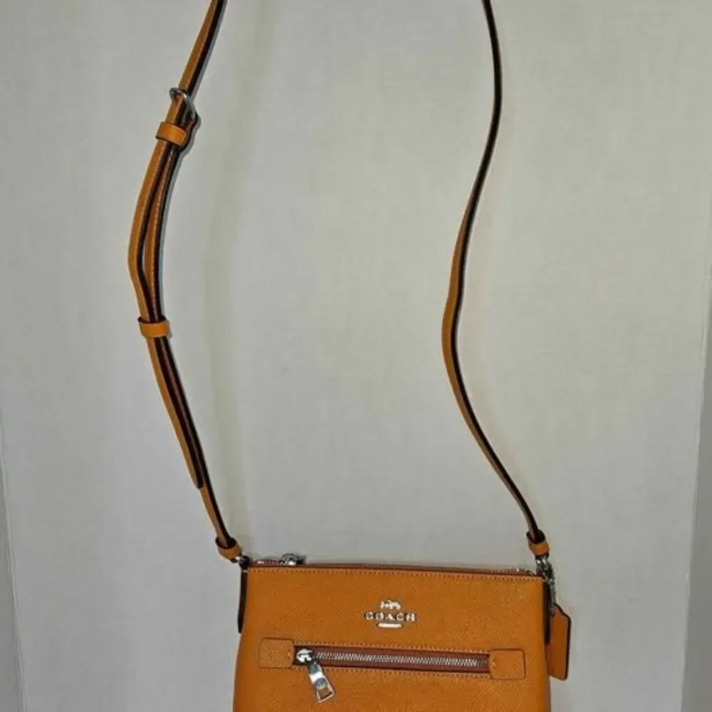 Coach Papaya Solid Crossbody Bag Zip Closure Adjustable Strap Inner Pockets